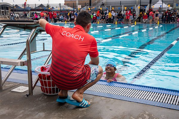 Coach Athlete swimming
