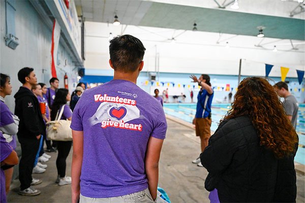 Volunteer swimming